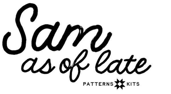 Black script text reading 'Sam as of late' with a small 'PATTERNS KITS' logo underneath on a white background.